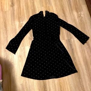 black dress with gold dots